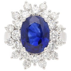 Anillo con halo de diamantes y zafiro azul real ovalado certificado GRS de 5,79 quilates