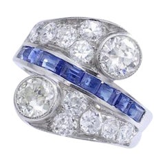 Diamond Sapphire Platinum Crossover Ring