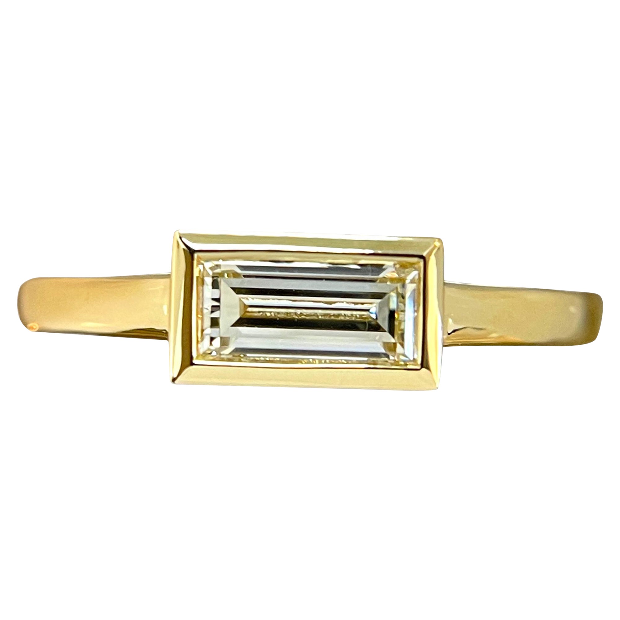 One of a kind 18K Yellow Gold Bezel Baguette Natural Diamond Ring For Sale