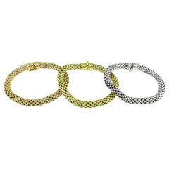 Suite de 3 bracelets en or jaune, rose et blanc de Fope