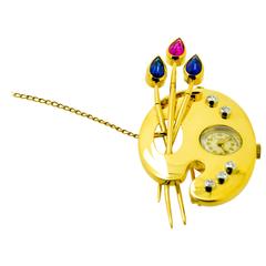 Diamond Sapphire and Ruby Gold Bucherer Clock Brooch