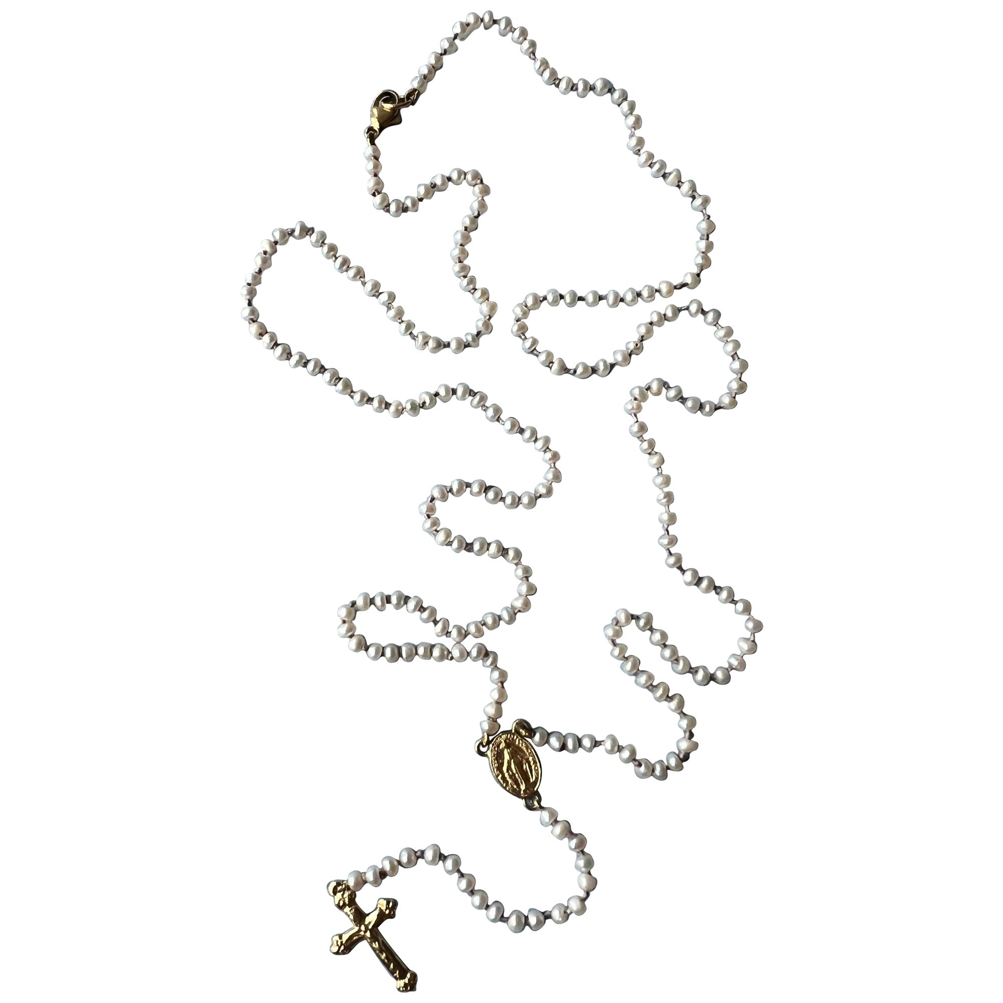 Rosario Necklace Cross Crucifix Virgin Mary 14 Karat Gold White Pearl Religious Spiritual

Length around the neck is 61 cm and total drop down length is 39 cm

Symbols or medals can become a powerful tool in our arsenal for the spiritual. 
Since