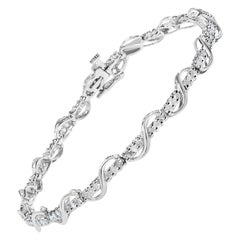 10K White Gold 1.00 Cttw Round-Cut Diamond Tennis Bracelet with Swirl Link