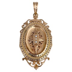Victorian 18 Karat Gold Seed Pearl Oval Ornamented Locket Pendant