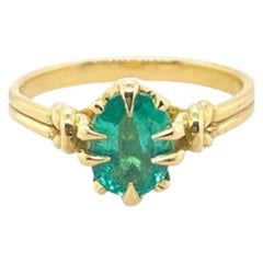Anillo Nudo de Arrecife de Esmeralda y Diamantes de 1 ct en Oro Amarillo de 18 ct