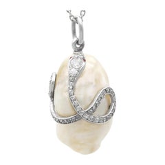 Antique Natural Saltwater Pearl, Ruby and 0.68Ct Diamond, Platinum Pendant