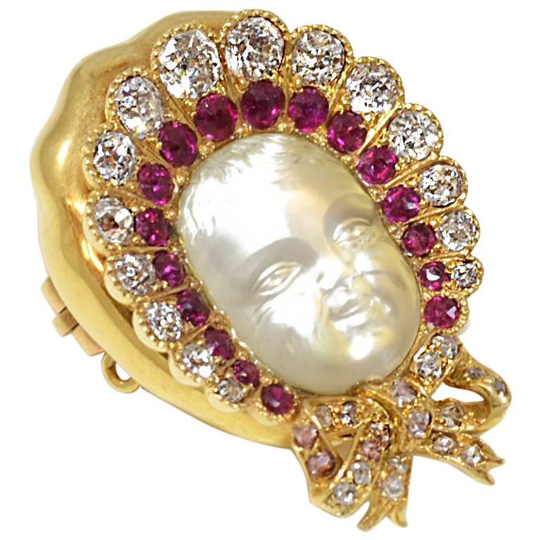 Antique Victorian Carved Moonstone ruby diamond gold Baby Brooch For Sale