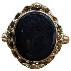 Oval Onyx ring. 10k ornate gold frame onyx ring. Mourning ring.