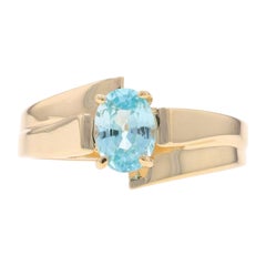 Anello Bypass con solitario di zircone blu in oro giallo - 14k Ovale 1,45ct Cattedrale