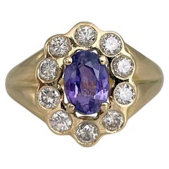 Vintage 18 Karat Gold 0.80 Carat Purple Sapphire 0.55 Carat Diamond Cluster Ring