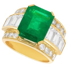 Anello d'epoca con smeraldo da 5,95 carati e diamante da 3,20 carati, oro giallo 18 carati, CIRCA 1990