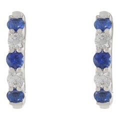18KT White Gold Huggie Earrings with Alternating Round Cut Diamonds and Blue Sap