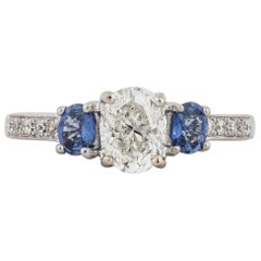 Dreisteiniger Verlobungsring mit Diamanten und Saphiren