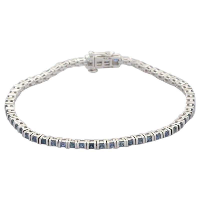 Bracciale tennis con zaffiro blu in oro bianco 18 carati