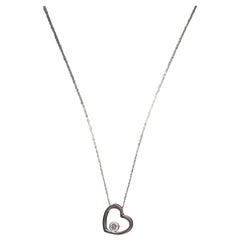 18k Open Heart 0.21ct Diamond Solitaire pendant. 14k 20in thin necklace. Bezel