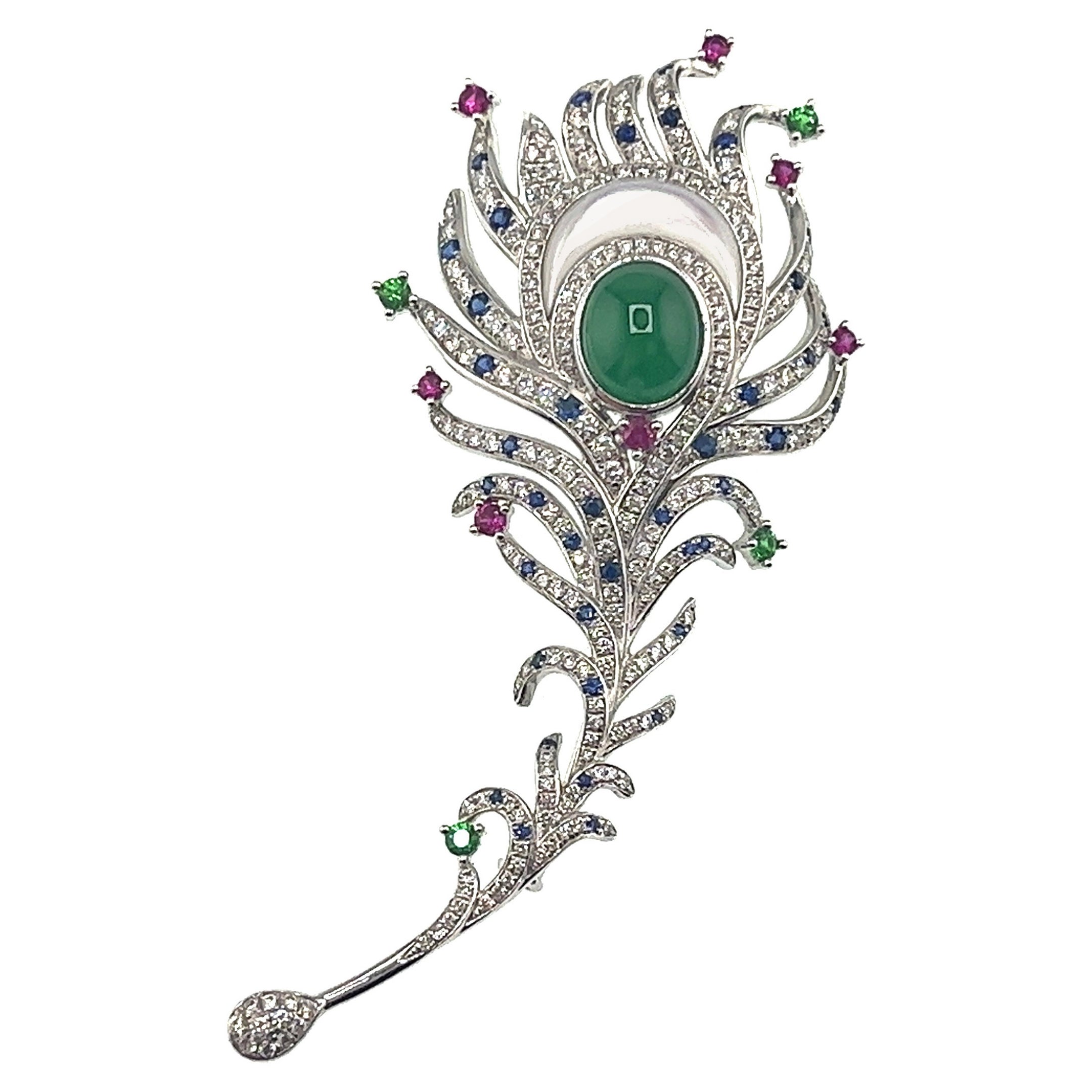1 giadeite - 1.900 CT
232 Diamanti - 1,254 CT
52 Zaffiri multicolore - 0,745 CT
Oro bianco 18K - 11,73 GM