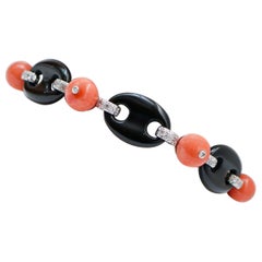 Coral, Black Agate, Diamonds, 14 Karat White Gold Bracelet.