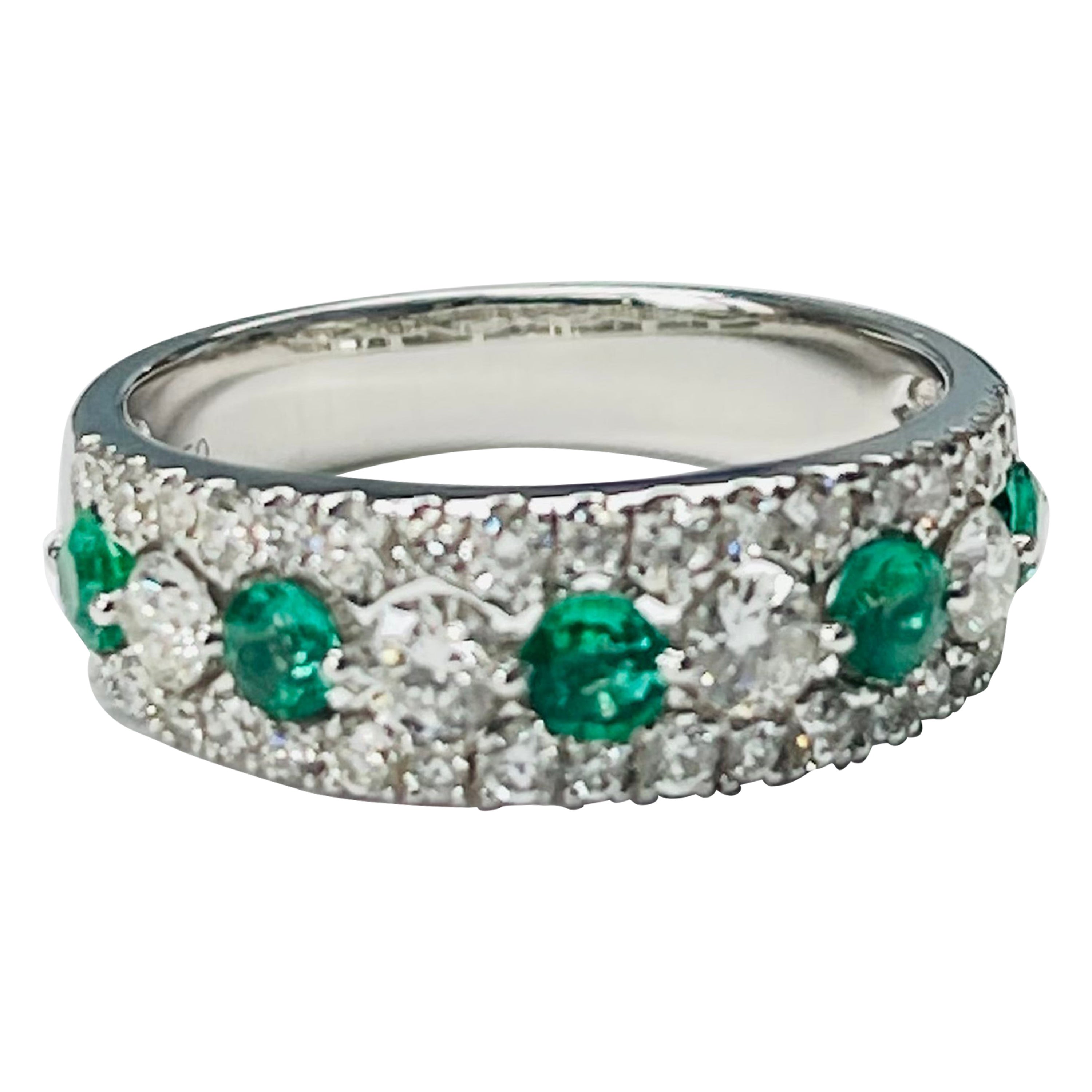 Emerald and Diamond Band Ring In 18 Karat White Gold.