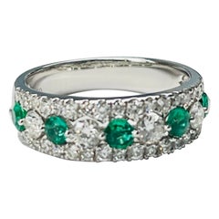 Emerald and Diamond Band Ring In 18 Karat White Gold.