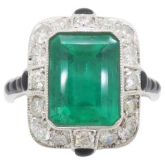 Anillo de Esmeralda Natural y Diamantes en Oro Blanco de 18k