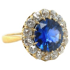 Sapphire and Diamond Cluster 18 Karat Yellow Gold Ring