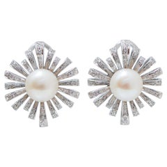 Pendientes de perlas, diamantes y oro blanco de 14 quilates.