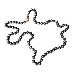 Collier ras du cou perles noires