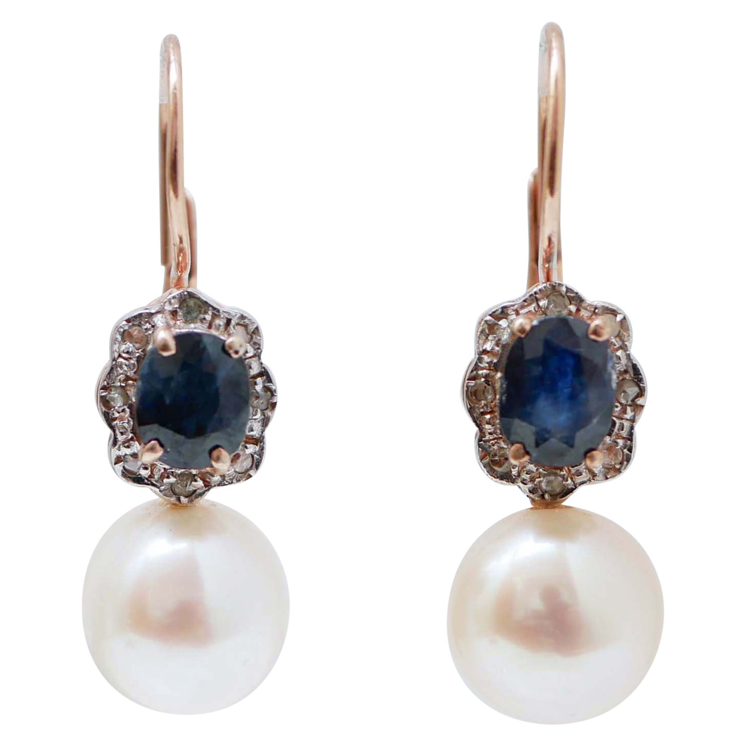 Ohrringe aus Roségold und Silber mit Perlen, Saphiren, Diamanten und Silber.