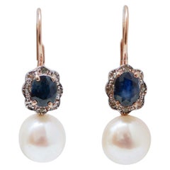 Ohrringe aus Roségold und Silber mit Perlen, Saphiren, Diamanten und Silber.