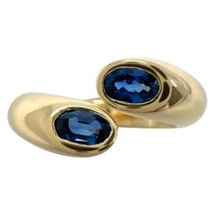 Cartier Vivid Blue Sapphire Oval Cut Ellipse 18k Gold Bypass Split Ring EU49