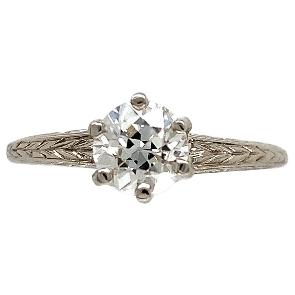 Antique 14K white gold hand engraved .78ct diamond engagement ring. The GIA repo
