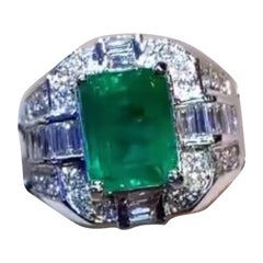 Esmeralda de Zambia de 3,89 quilates certificada por AIG  1,28 qt Diamantes Oro 18K  Anillo