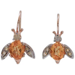 Topazs, Diamonds, Rose Gold and Silver Fly Shape Earrings.