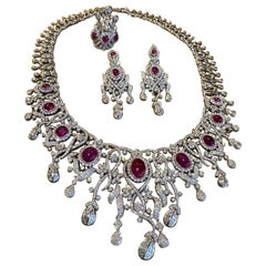 Collana Chandelier di Rubini e Diamanti con Anello e Orecchini in Oro Bianco 18k