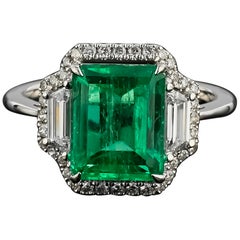 Set In 18K White Gold 4 Carat Colombian Emerald and Diamond Engagement Ring