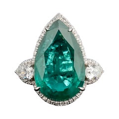 Certified 9.37 Carat Emerald Pear Shape and Diamond Three Stone Cocktail Ring