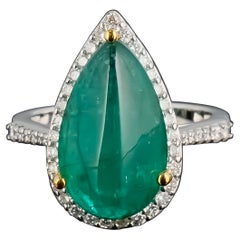 7.54 Carat Pear Shape Emerald Cabochon and Diamond Ring