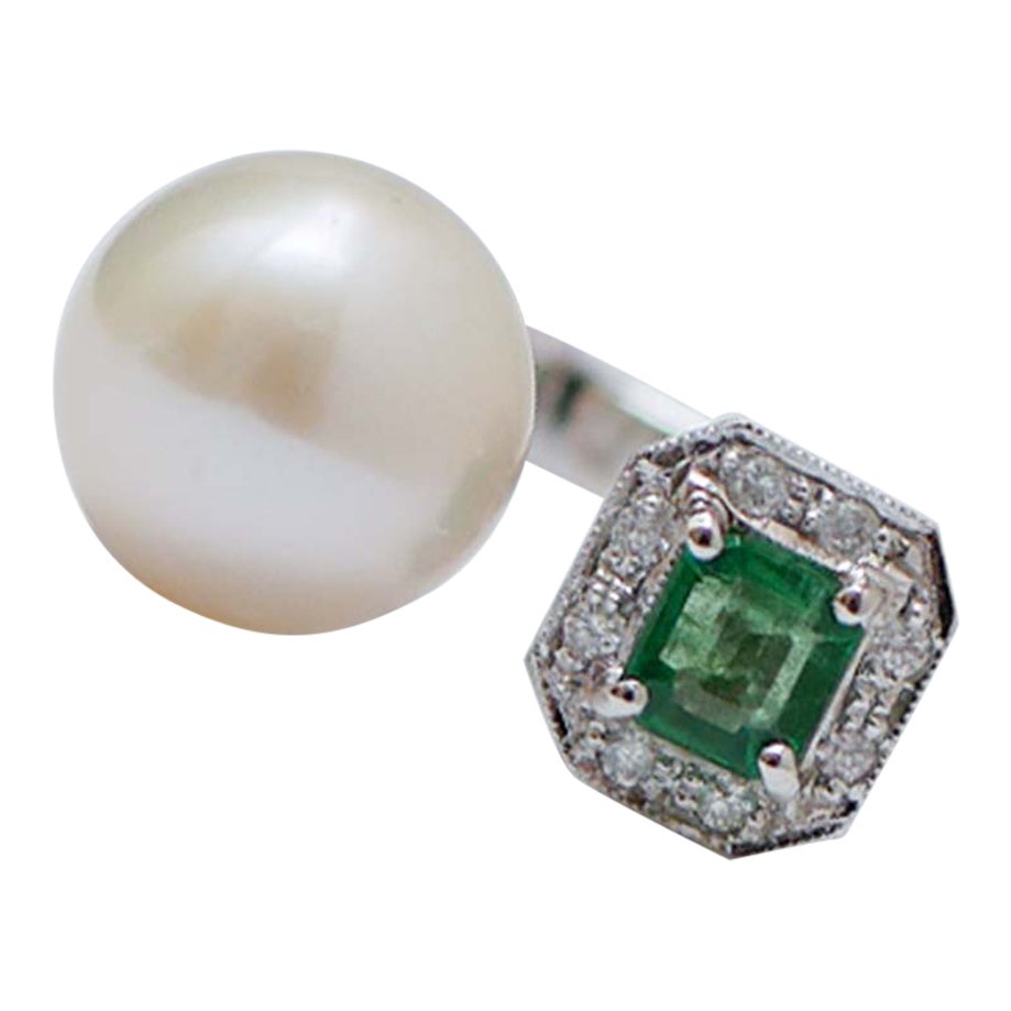 Pearl, Emerald, Diamonds, Platinum Ring.