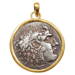 Silberner Tetradrachm Alexander der Großen mit 22 Karat Goldbesatz
