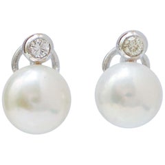 10, 5 Mm Pearls, Diamonds, 14 Karat White Gold Earrings.