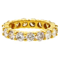 Anello di eternità con diamante rotondo da 3,30 carati in oro giallo 18K