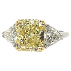 GIA Certified 5.75 Carat Fancy Light Yellow Natural Diamond Plat Engagement Ring
