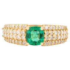 Verlobungsring aus 18 Karat massivem Gelbgold mit Smaragd im Kissenschliff und Diamant im Unisex-Schliff