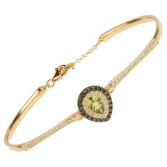 Peridot-Armband im Birnenschliff aus 18 Karat Gold mit blauen und weißen Pavé-Diamanten