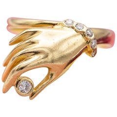 Bague vintage en or jaune massif 18 carats - élégante main - signe d'amour