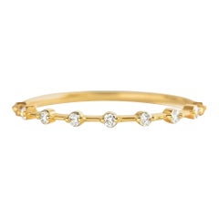 Half eternity moissanite 14k gold ring.