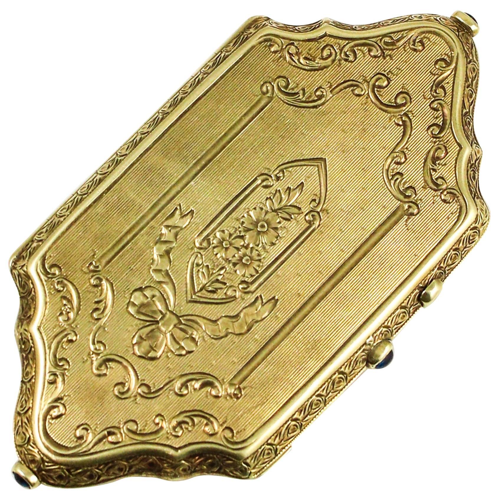 Exquisite Gold Engraved Compact With Sapphire Accents