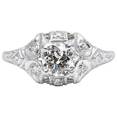 Antique Art Deco 0.60 Carat Diamond Filigree Engagement Ring in Platinum