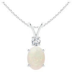 Ciondolo Opale ovale naturale con accenti di diamanti in oro bianco 14 carati