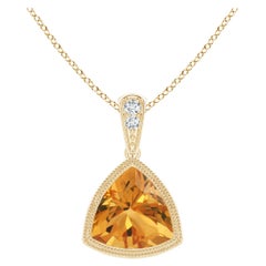 Colgante de citrino trillón natural engastado en bisel con milgrain en oro amarillo de 14 quilates